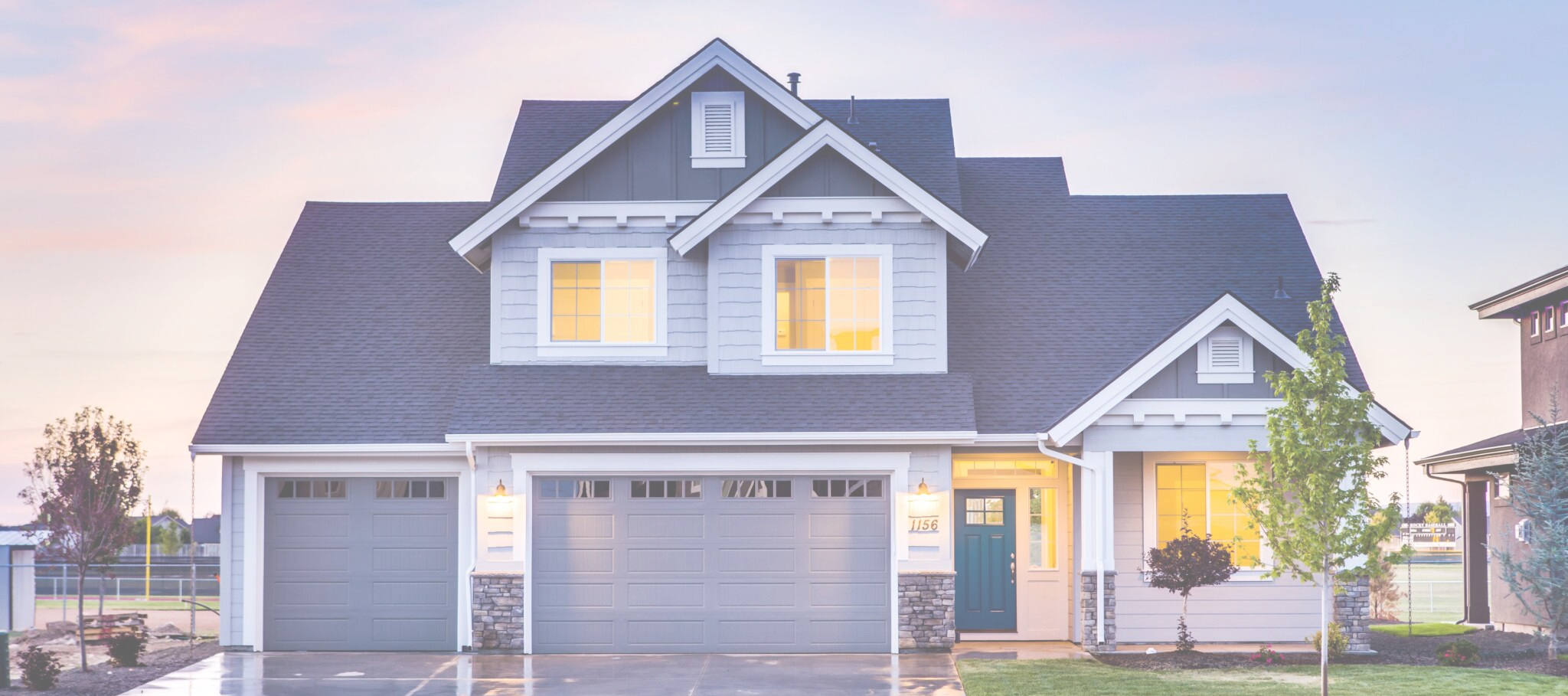 A beautiful modern house at dusk.